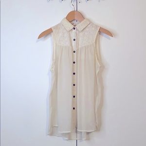 Adorable sleeveless blouse with open back